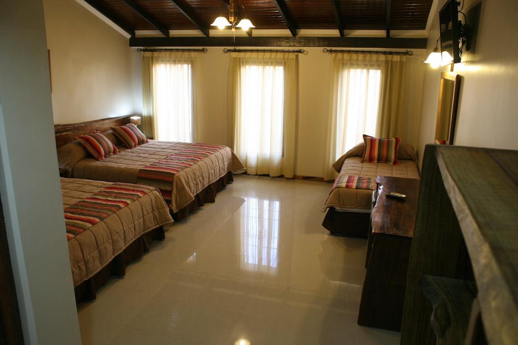 Posada Del Jacaranda ปูแอร์โตอีกวาซู ห้อง รูปภาพ