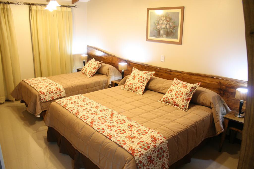 Posada Del Jacaranda ปูแอร์โตอีกวาซู ห้อง รูปภาพ